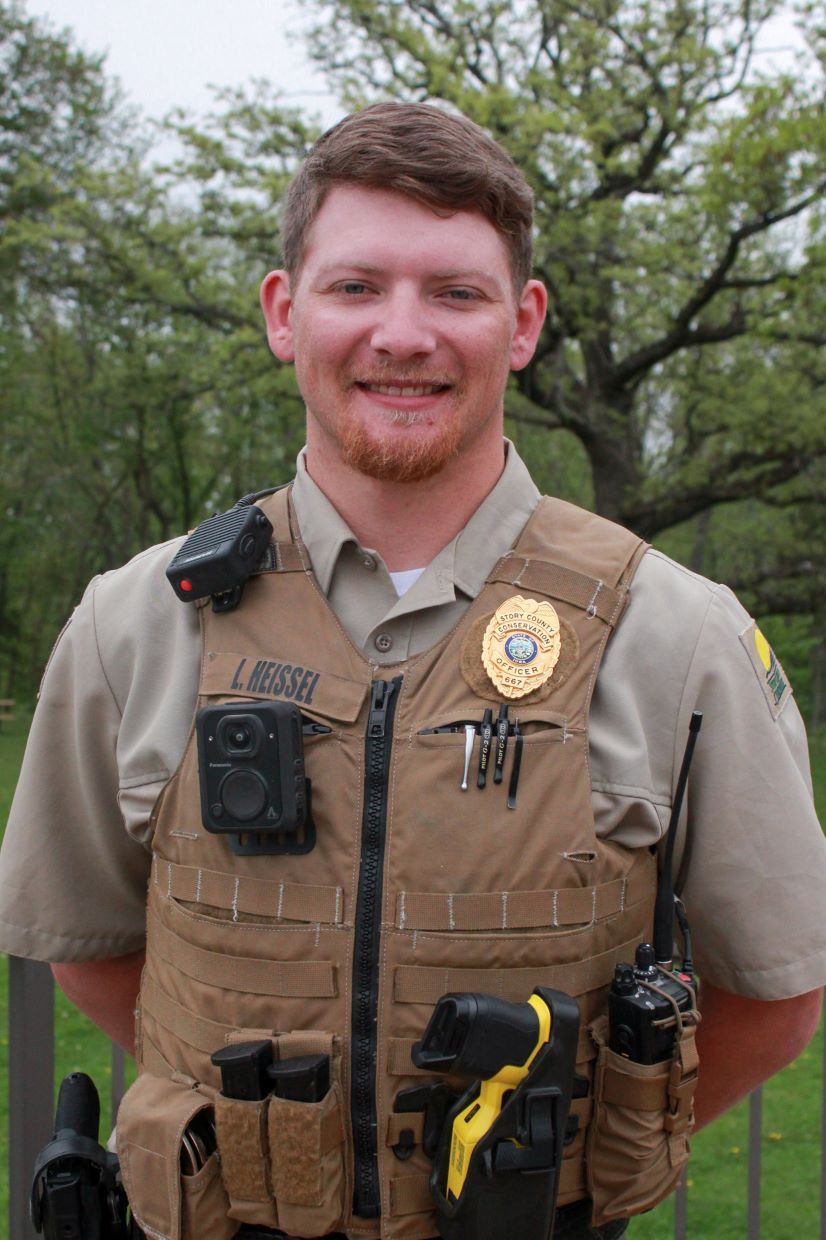 Logan Heissel headshot in park ranger uniform
