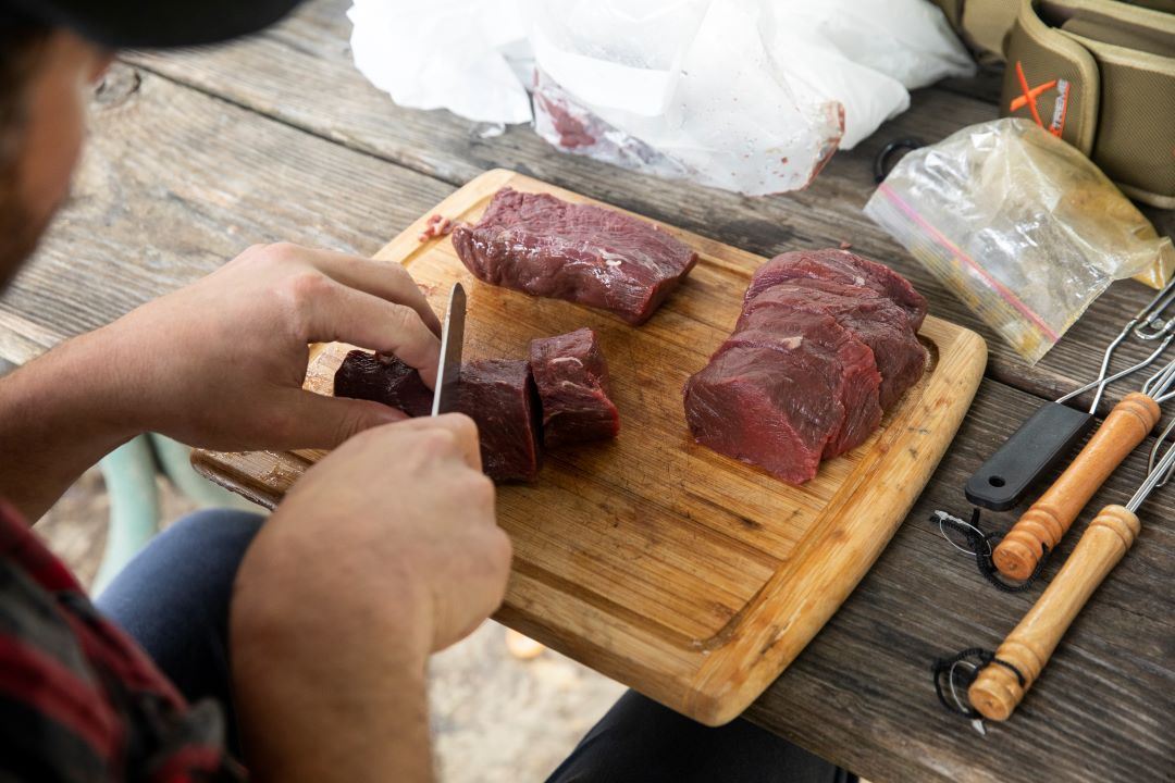 Lime green logo with deer for Field to Fork program